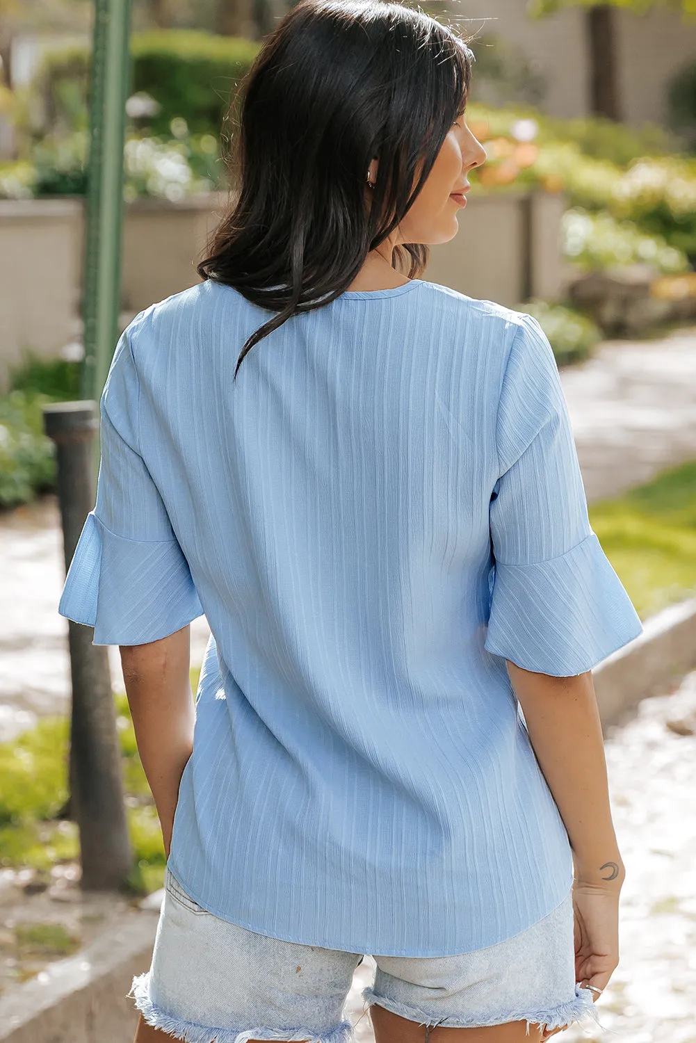 Capri Ruffled Half Sleeve V Neck Textured Top.